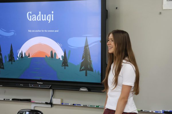 Sophomore Alyssa Theofanidis presents Native American phrases during recent forum. 