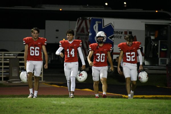 Kickers Gabriel Pope, Cesc Baizan and Cesar Adrogue, along with long snapper Matias Pope, walk confidently onto Skip Lee Field, poised to take on the Pioneers.