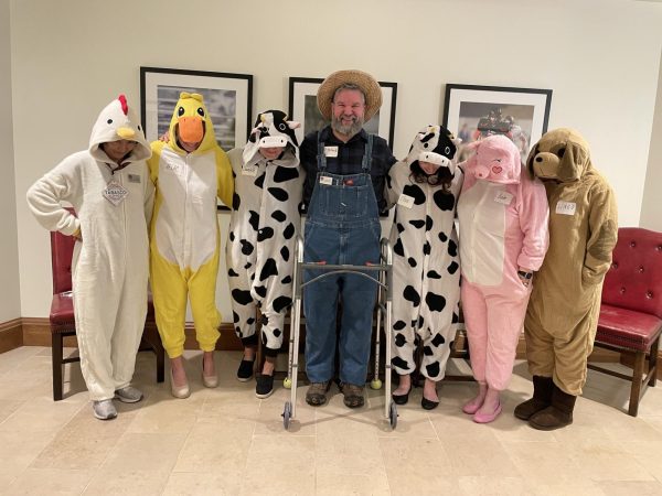 College counselor Jeremy Johnson dresses as Old McDonald, along with his farm animal colleagues. 