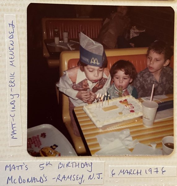 Matt Stein (left) blows out candles at his fifth birthday at McDonald’s alongside his sister and Erik Menendez (right). Photo courtesy of Matt Stein.


